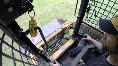 how to operate cat skid steer